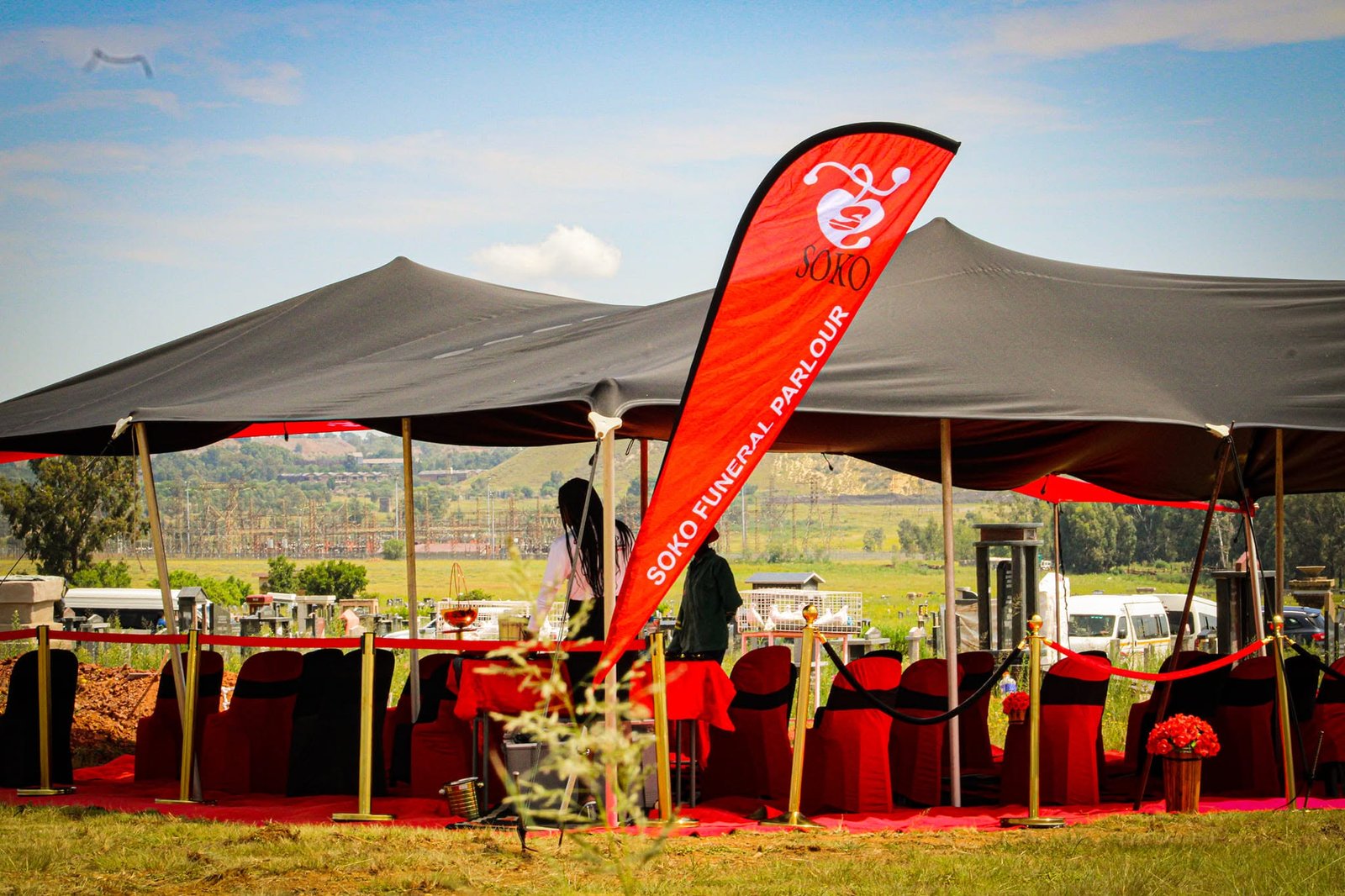 Funeral tents and dressed chairs in Soko colours